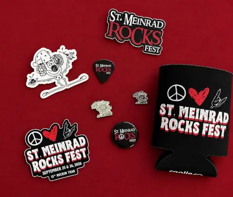 Stickers, pins, and coozies with the Rocks Fest logo